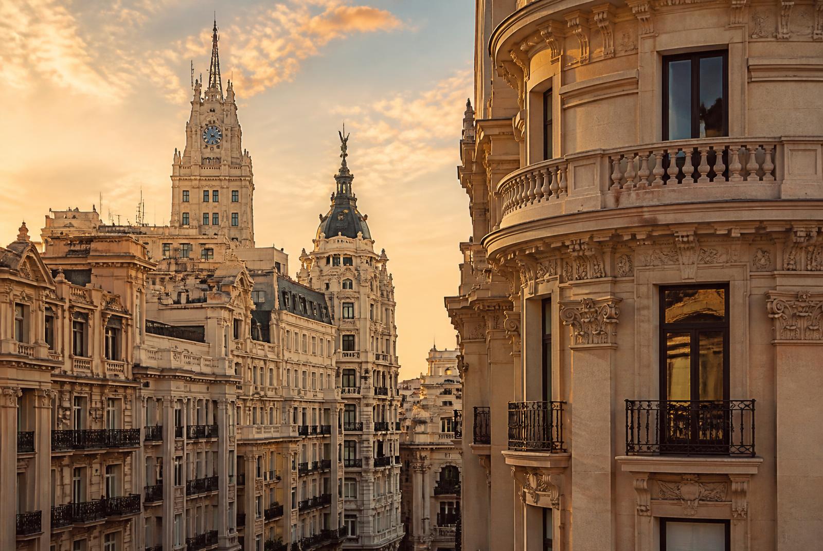 Classical Madrid facades and balconies along Gran Vía at golden hour